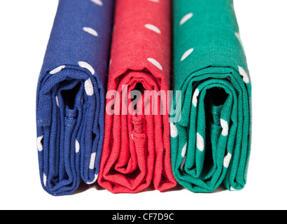 Folder linen handkerchiefs in red blue and green with white spots Stock Photo