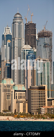 The skyscrapers of the 'Dubai Marina' area (Dubai - the United Arab Emirates). Les gratte-ciel du quartier 'Dubai Marina'. Dubaï Stock Photo