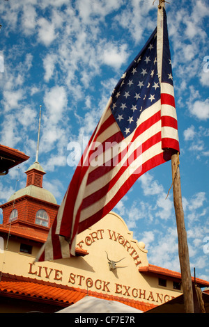 US Flag waiving in the wind outside the Forth Worth Stock Exchange building. Stock Photo