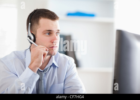 Call center agent speaking with costumer Stock Photo