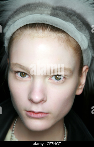 Rick Owens Paris Backstage Ready to Wear Autumn Winter  A female heavy white foundation, pale brown pencilled eyebrows soft Stock Photo