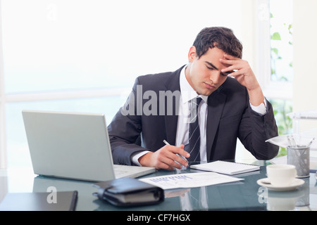 Focused businessman working Stock Photo