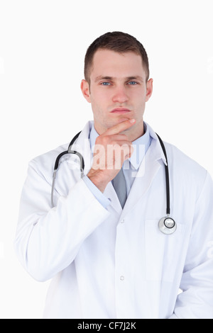 Close up of doctor lost in thought Stock Photo