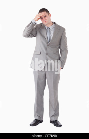 Portrait of a tired young businessman having a headache Stock Photo