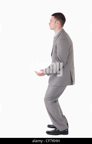 Portrait of a businessman carrying something Stock Photo