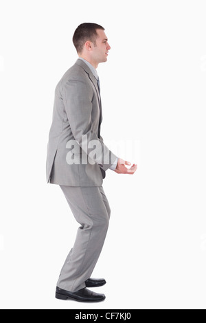 Portrait of a handsome businessman carrying something Stock Photo