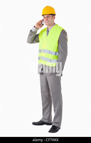 Portrait of a smiling builder making a phone call Stock Photo