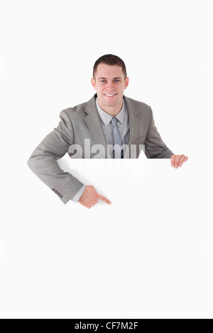 Portrait of a smiling entrepreneur pointing at something Stock Photo