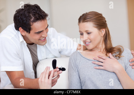 Man making his girlfriend speechless with proposal Stock Photo