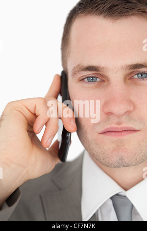 Close up of a serious businessman making a phone call Stock Photo