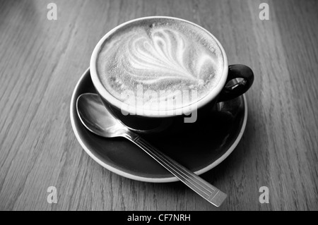 Flat White Coffee with Standard or Simple Rosetta Artistic Design in the Foam. New Zealand Stock Photo