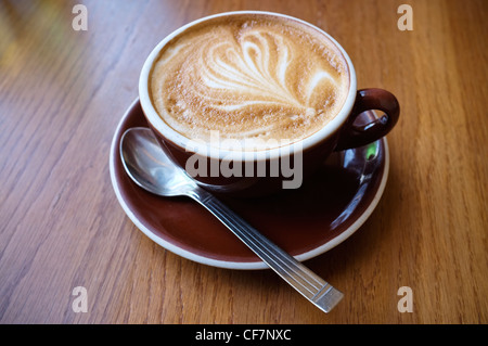 Flat White Coffee with Standard or Simple Rosetta Artistic Design in the Foam. New Zealand Stock Photo