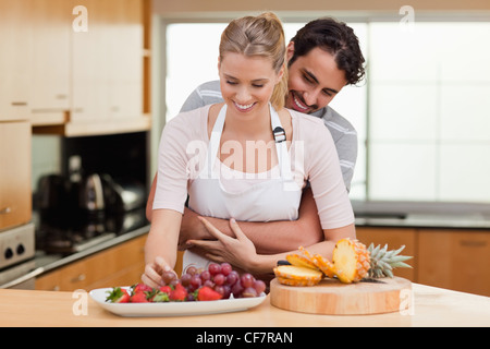 Couple eating fruits Stock Photo