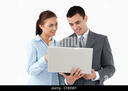 Business partners using laptop Stock Photo