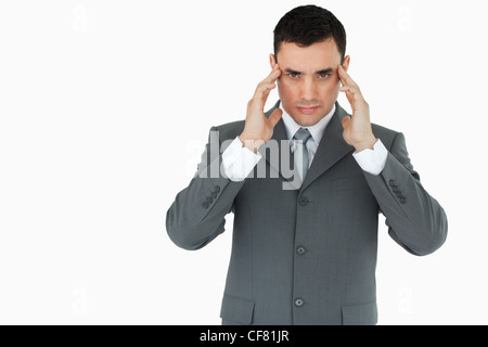 Businessman suffering from a headache Stock Photo