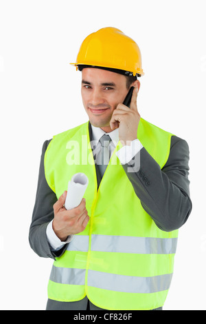 Smiling architect on the phone Stock Photo