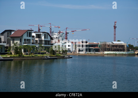 Waterfront luxury homes and condominium apartments are seen at Sentosa Cove in Singapore. Stock Photo