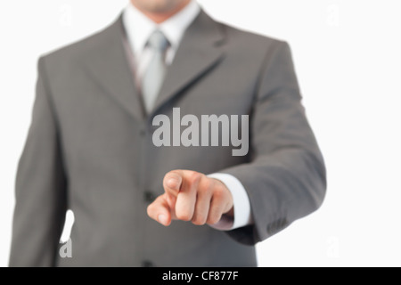 Hand pressing an invisible key Stock Photo