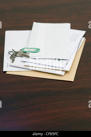 Mail and keys on the table Stock Photo
