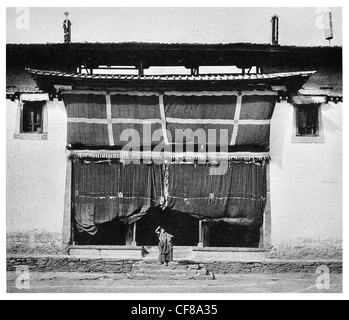 1926 Atuntze Lamasery Lama in front of a yak hair curtain temple Dêqên County Tibet  Yunnan province, China. Stock Photo