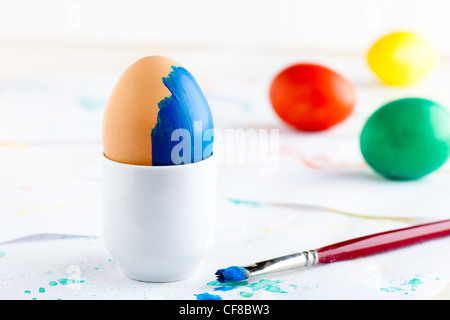 Coloured Painted Easter Eggs with a Brush Stock Photo