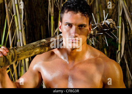 View of a fighter man holding a medieval mace weapon. Stock Photo