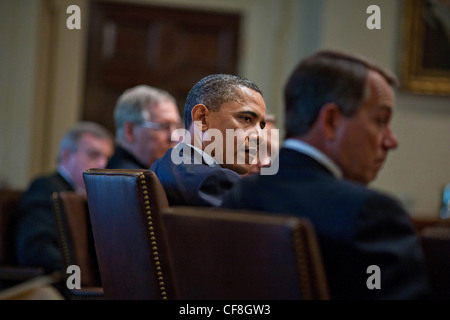 President Barack Obama meets with bipartisan House and Senate Leadership in the Cabinet Room of the White House to discuss his upcoming fiscal policy speech April 13, 2011 in Washington, DC. Stock Photo