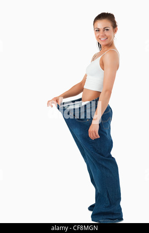 Sporty Women Showing Big Pants of Pajama. Sisters Lost Weight Together  Stock Photo - Image of showing, size: 142416040