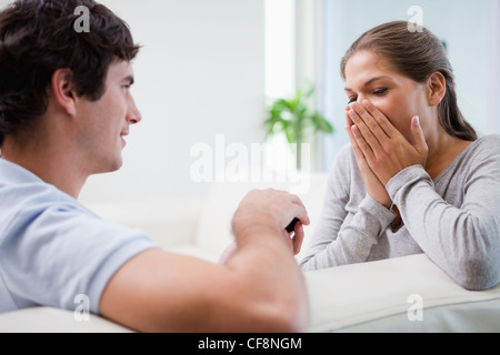 Man making his girlfriend speechless with proposal Stock Photo