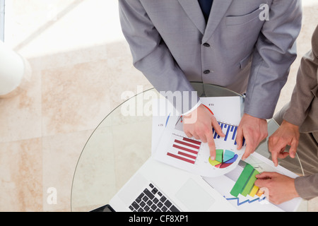Analysts looking at research data Stock Photo