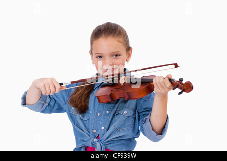 Girl playing the violin Stock Photo