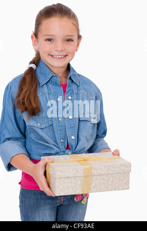 Portrait of a girl holding a gift box Stock Photo