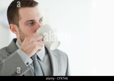 Businessman drinking tea Stock Photo