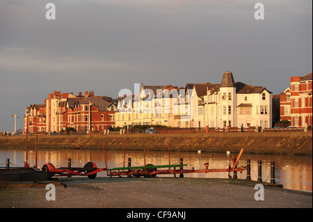 Evening light on the grand houses along The Promenade, beside the Marine Lake, Southport, Merseyside, England, UK. Reflections in the water Stock Photo