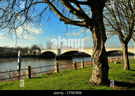 chiswick bridge, crossing the river thames, seen at low tide from ...