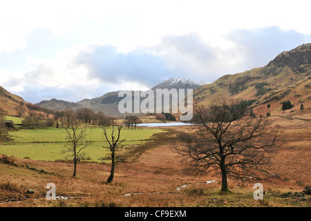 View of  snow capped  hills around Blea Tarn in winter taken from road coming up from the Langdale Valley, Nr. Ambleside, Cumbria, England, UK Stock Photo