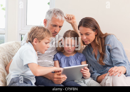 Family using a tablet computer Stock Photo