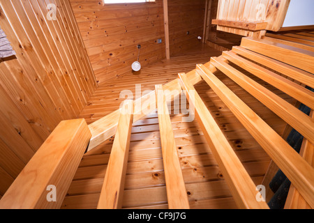 Detail of wooden staircase in lodge apartment. Fox Glacier Lodge, Fox Glacier, West Coast, South Island, New Zealand. Stock Photo