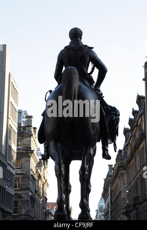 Duke of Wellington statue view from the back, Queen Street / Royal Exchange Square, Glasgow city centre, Scotland, UK Stock Photo