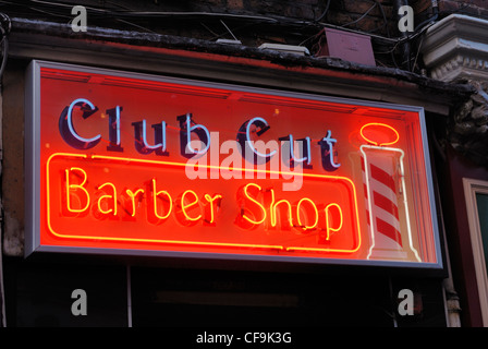 Illuminated barbers sign in Matthew Street, ( Cavern Walks ) in Liverpool. Stock Photo
