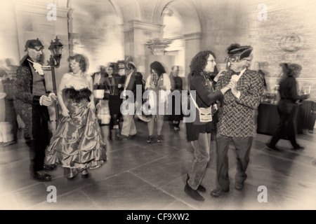 A motion blur  black and white photograph showing two couples dancing Stock Photo