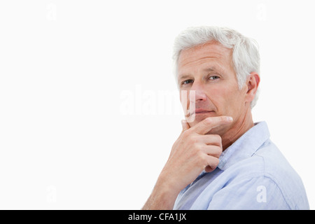 Mature man thinking Stock Photo
