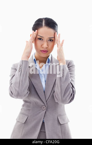 Portrait of a gorgeous businesswoman having a headache