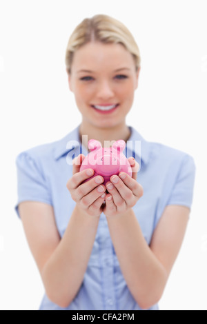 Beautiful young woman with piggy bank on white background Stock Photo ...