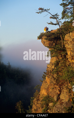 Young couple hiking Barron Canyon, Algonquin Provincial Park, Ontario, Canada. Stock Photo