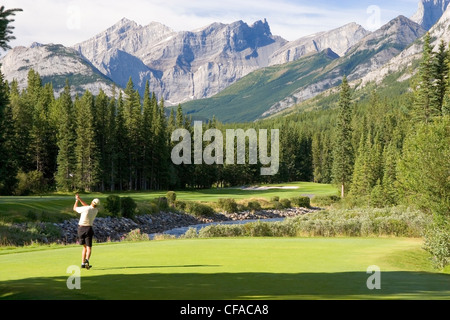 30-40 year old playing golf, Kananaskis Country, Alberta, Canada. Stock Photo