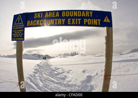 Skiers heading into the backcountry at Sunshine Village, Banff, AB Stock Photo