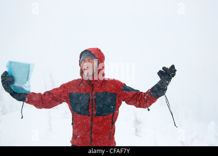 Middle-aged man laughing because lost winter Stock Photo