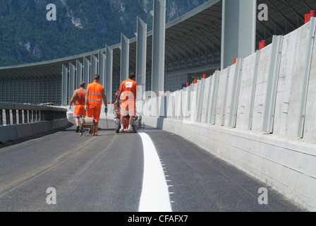 Switzerland, Europe, Ticino, construction, road construction, highway, road, resurfacing, coat, mark, service lane, line, white Stock Photo