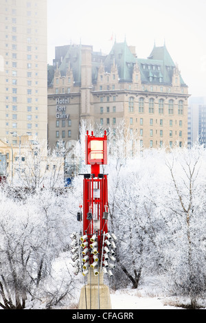 Red navigation light of The Forks Harbour and Hotel Fort Garry on a frosty winter day. Winnipeg, Manitoba, Canada. Stock Photo